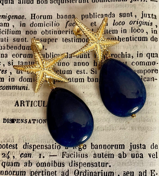 Orecchini con stella in argento 925 e perla a goccia blu.(