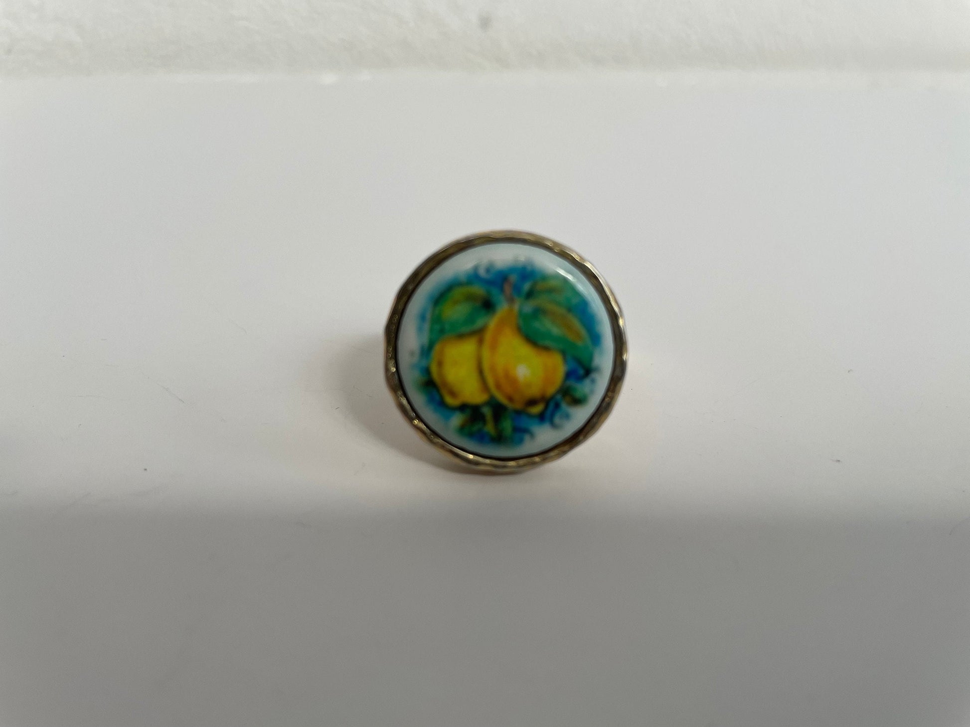 Anello regolabile, struttura ottone regolabile, anello con mattonella, anello ceramica di caltagirone, anello varie fantasie.<