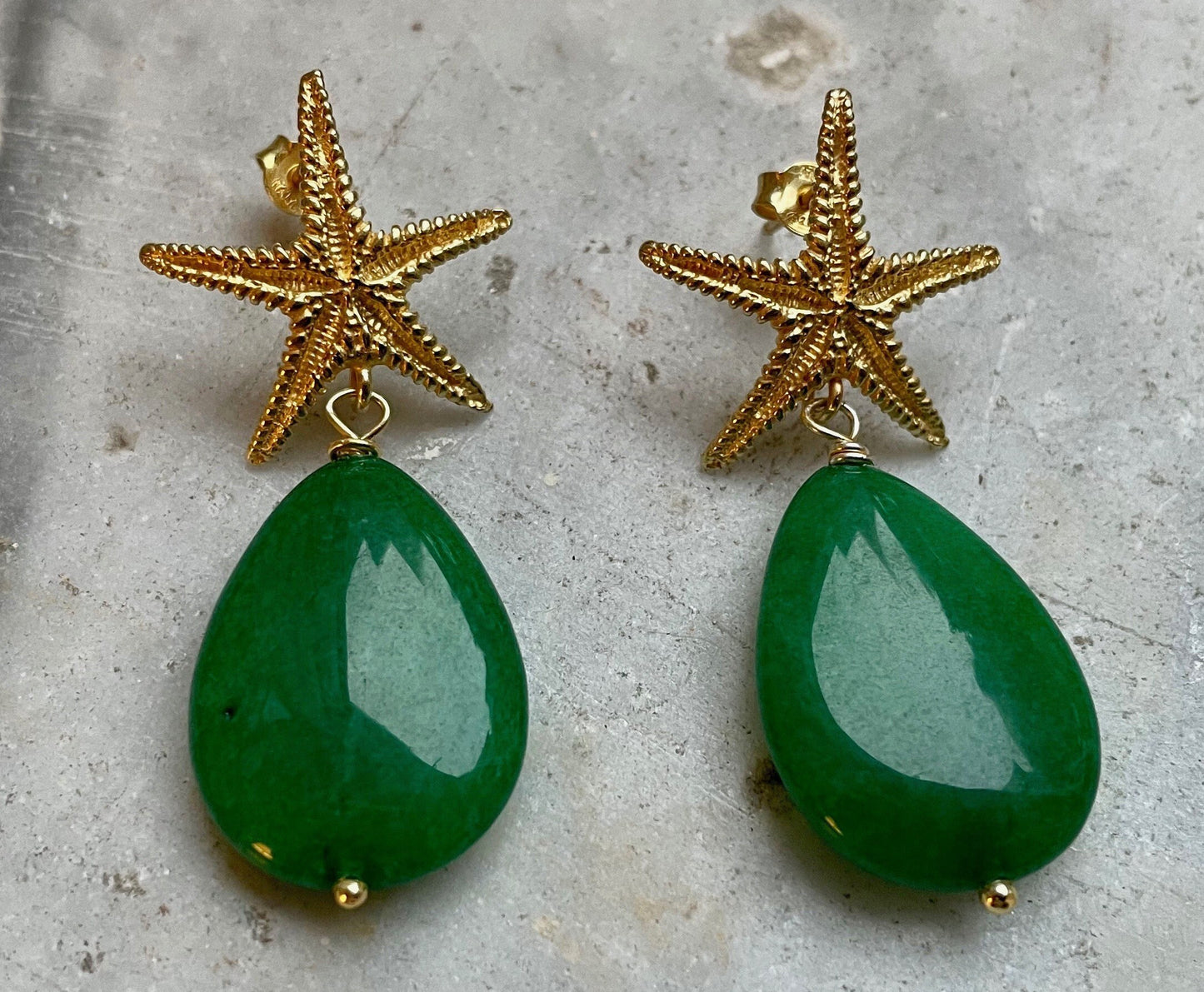 Orecchini con stella in argento 925 e perla a goccia verde.(