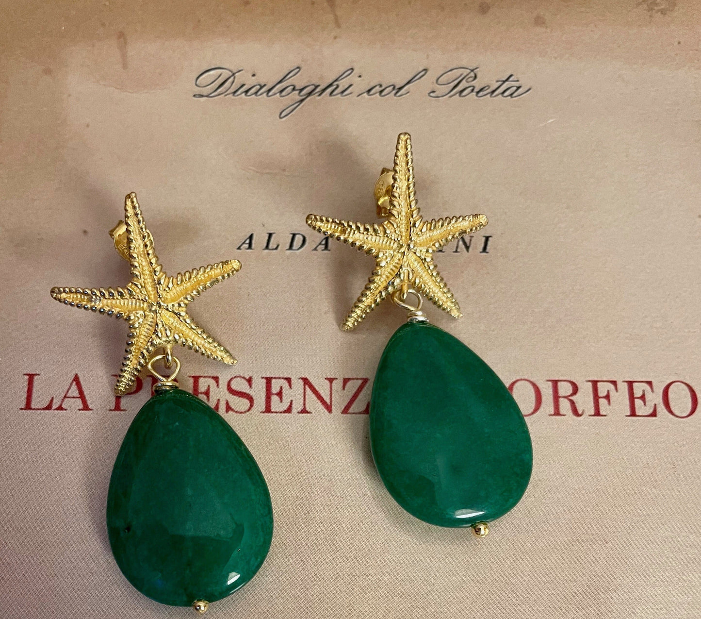 Orecchini con stella in argento 925 e perla a goccia verde.(