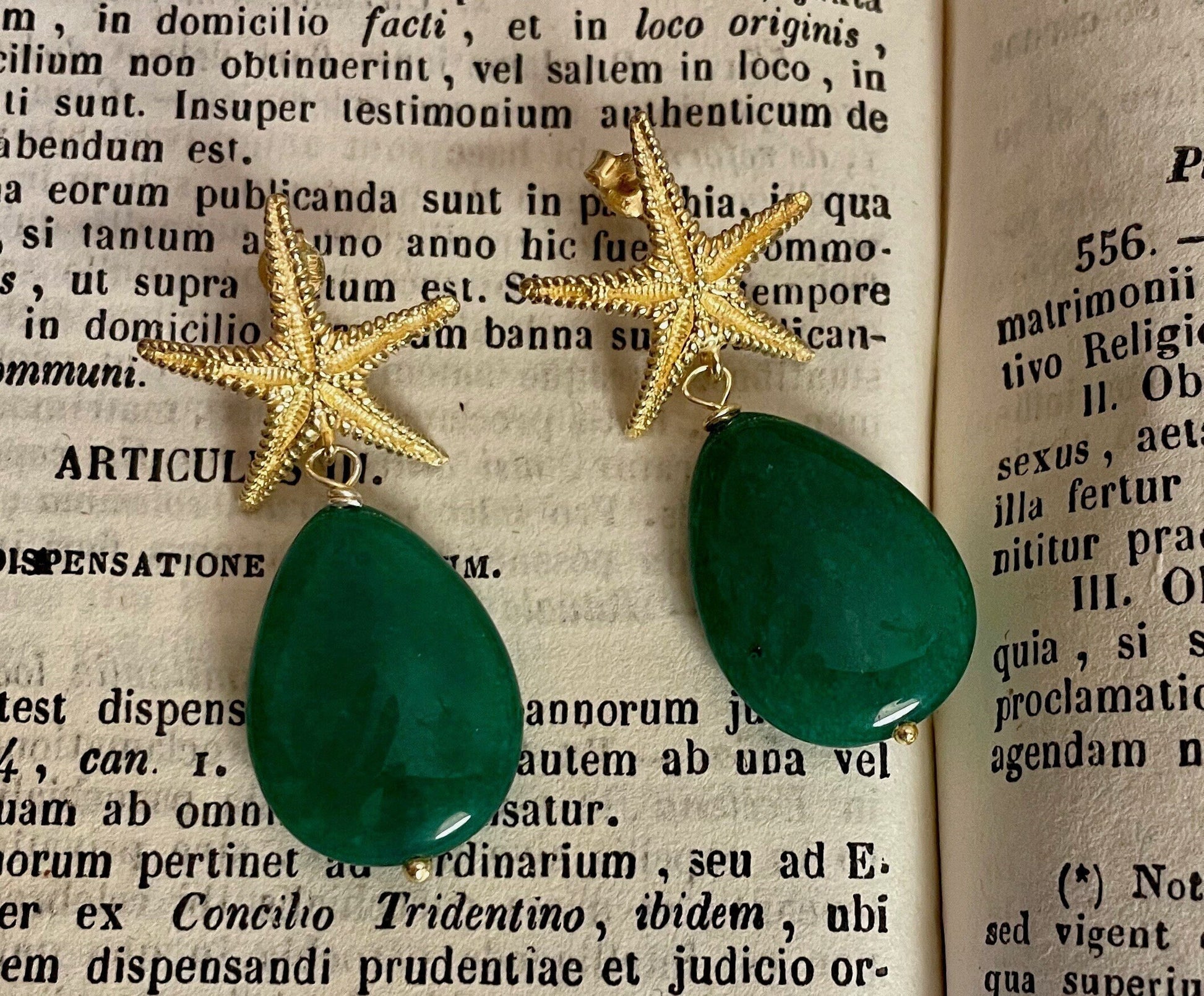 Orecchini con stella in argento 925 e perla a goccia verde.(