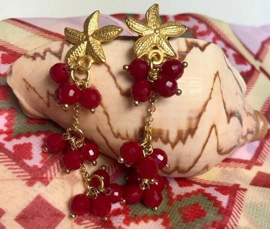 Orecchini pendenti, perno zama e perle di agata rossa.(