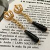 Orecchini con perni in zama e perla a goccia di onice.(