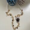 Collana siciliana con testa di moro in ceramica di Caltagirone, bianca e nera, agata bianca e onice. regalo per lei.ç