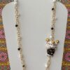 Collana siciliana con testa di moro in ceramica di Caltagirone, bianca e nera, agata bianca e onice. regalo per lei.ç