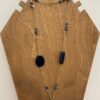 Collana lunga con catena ottone dorato, pietre blu e ciondolo cuore.ç