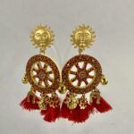 orecchini ruota di carretto e nappe rosse