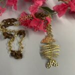 collana lunga con ciondolo pesce