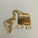 collana siciliana artiginale con ciondolo vista Etna