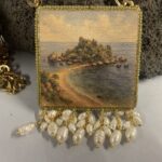 Collana siciliana Isola Bella Taormina – Collana artigianale con ciondolo in legno e perle di fiume Collane caratteristiche siciliane