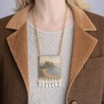 Collana siciliana Isola Bella Taormina – Collana artigianale con ciondolo in legno e perle di fiume Collane caratteristiche siciliane